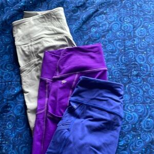 Bundle of 3 Fabletics Motion 360 leggings